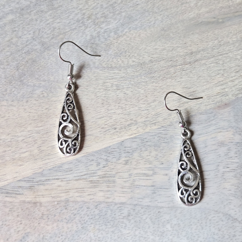 NWOT Elegant Silver Dangle Earrings